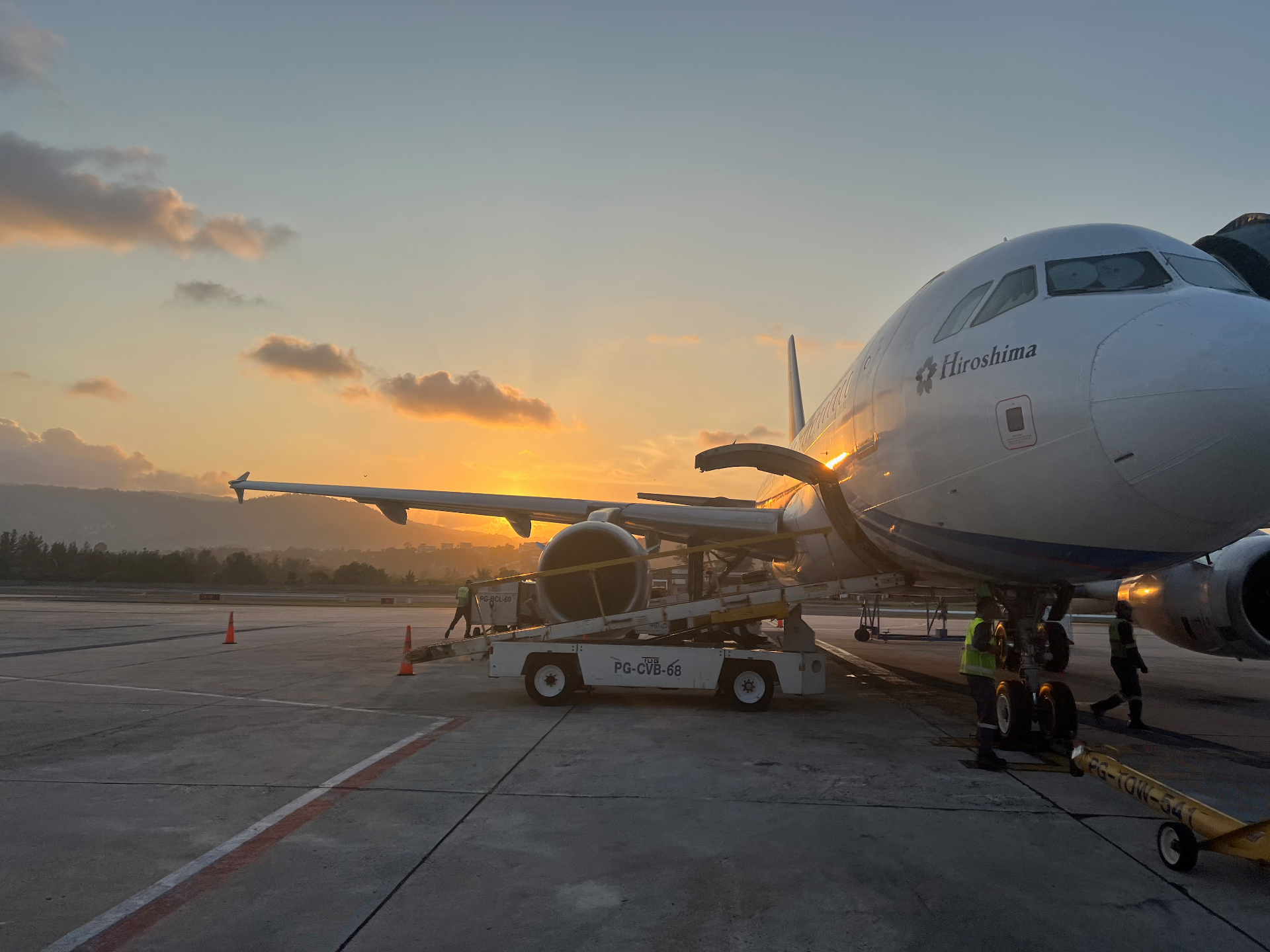 Ko Samui — Golden hour on the tarmac at Samui Airport before takeoff.