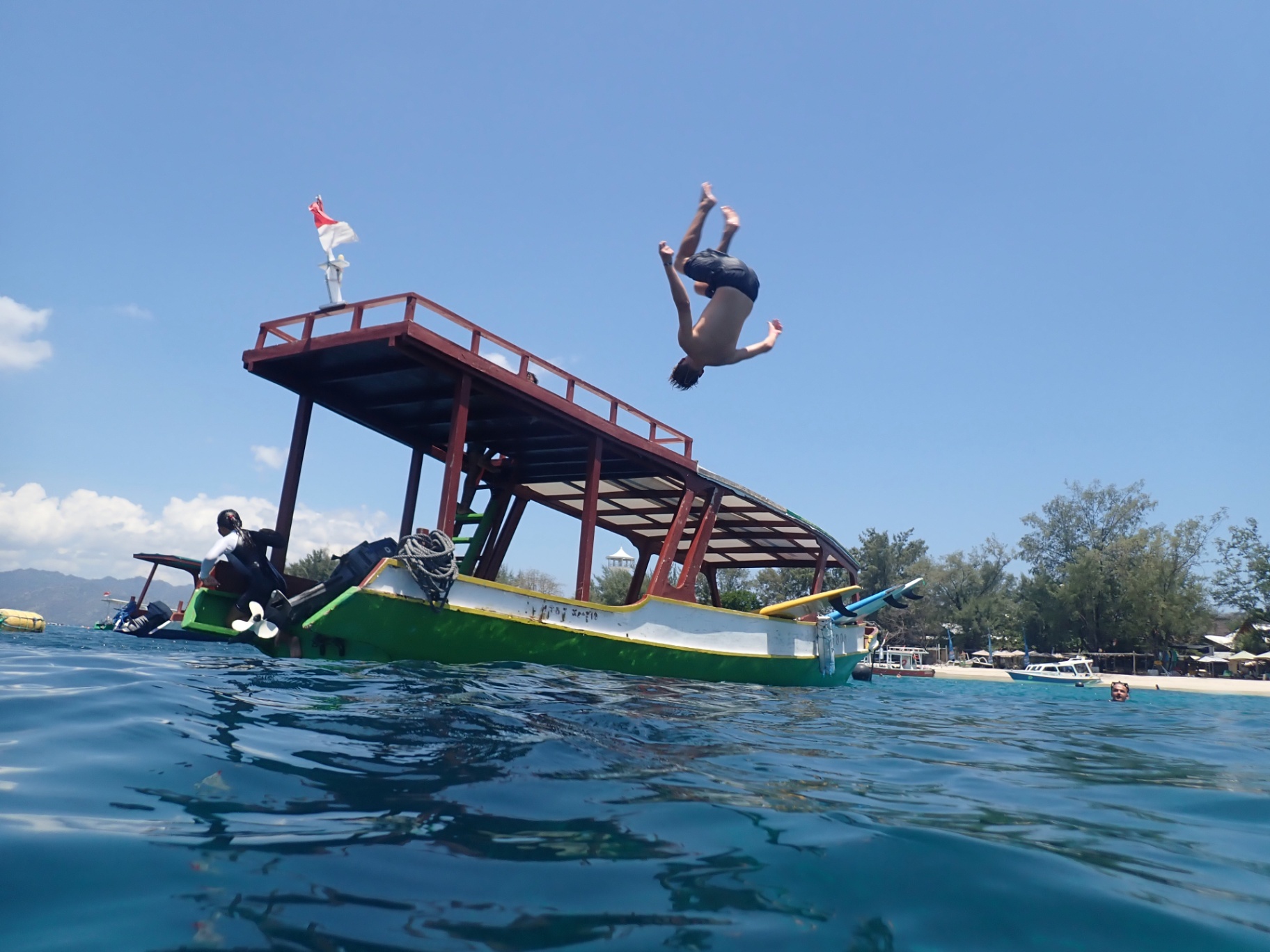 Gili Trawangan — Backflip off the snorkel boat into glass-clear water.
