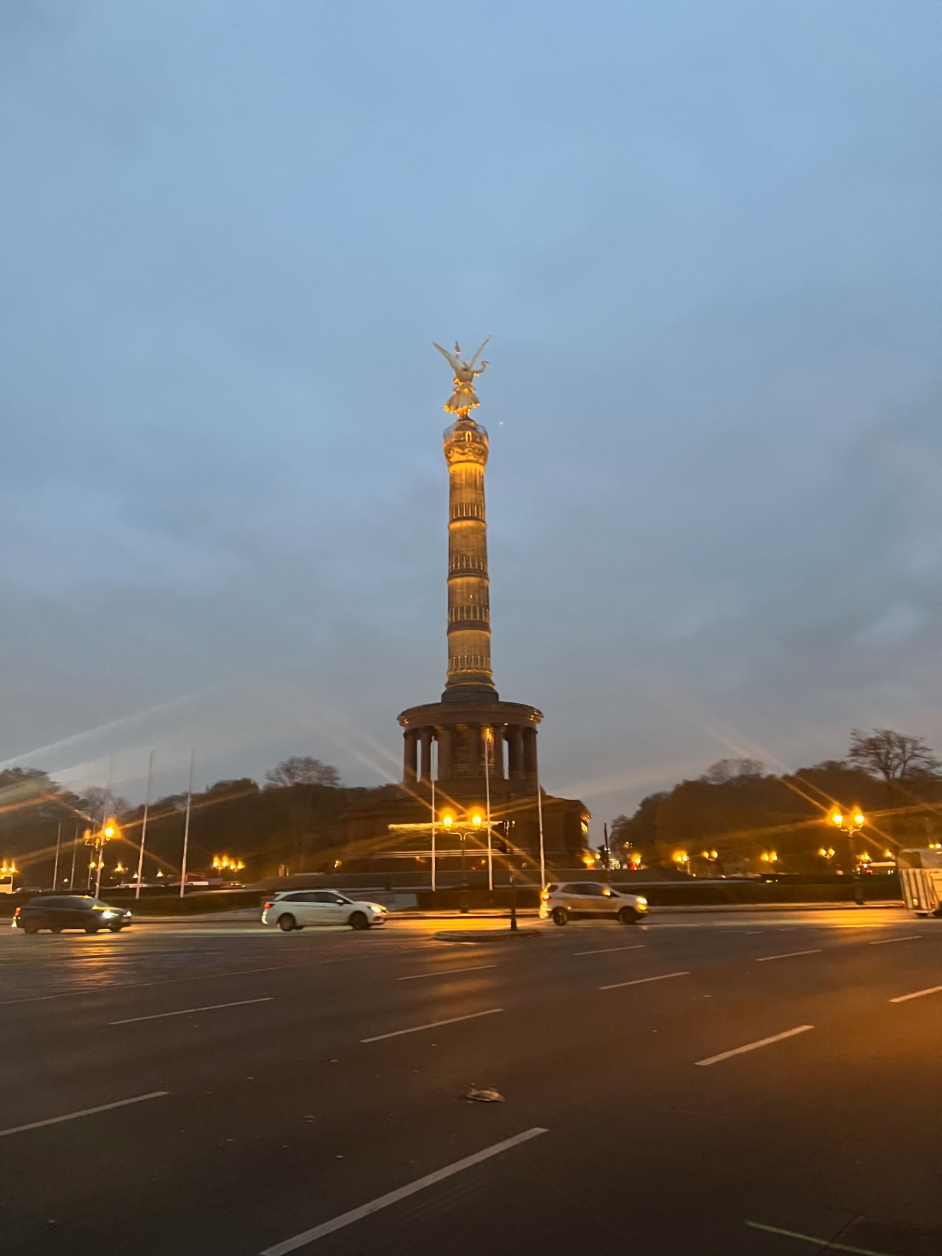 Berlin — Siegessäule glowing through Berlin dusk.