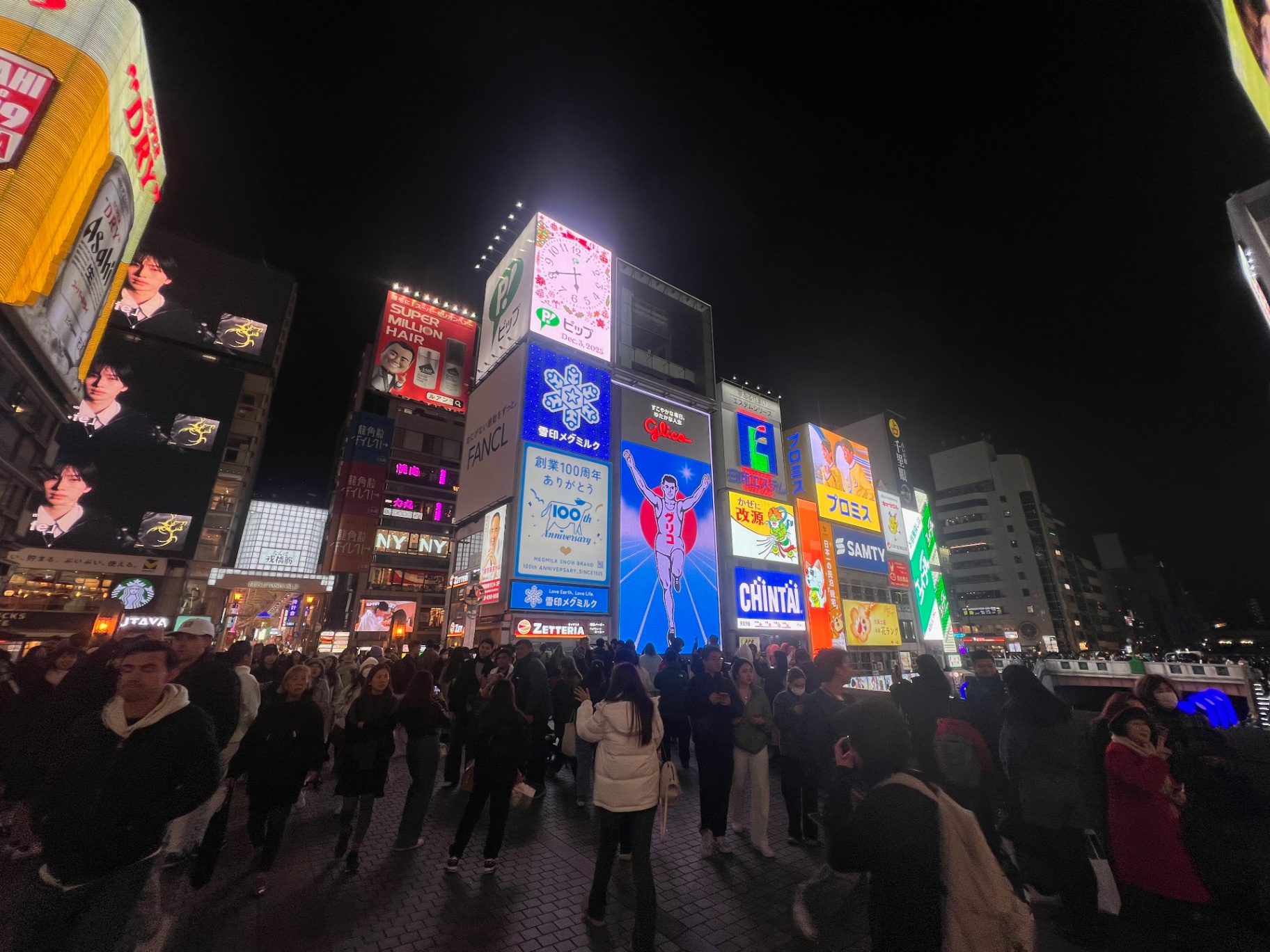 Osaka — Dotonbori at night, drowned in neon and Glico's glowing runner.