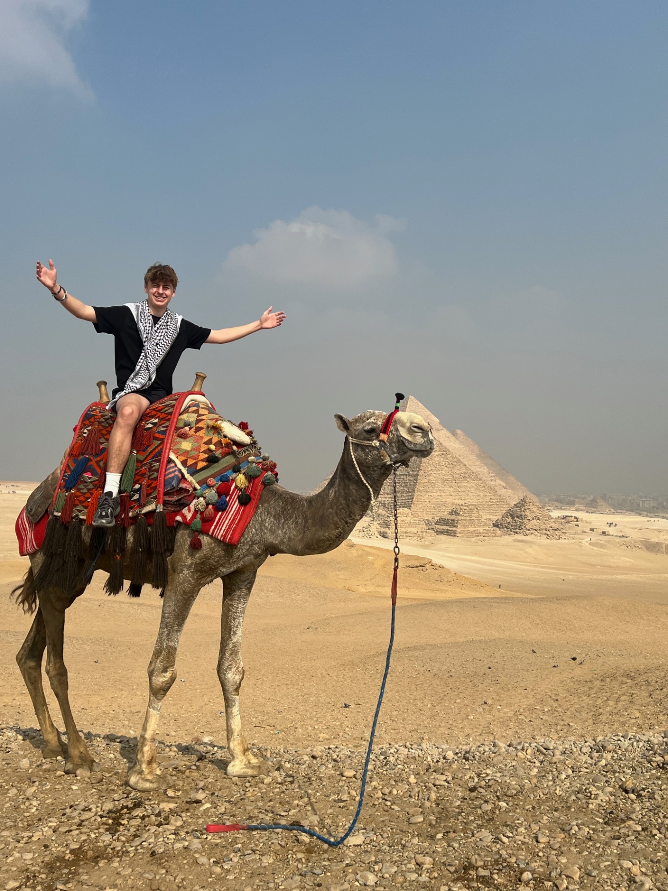 Cairo — Camel ride at the Pyramids of Giza.