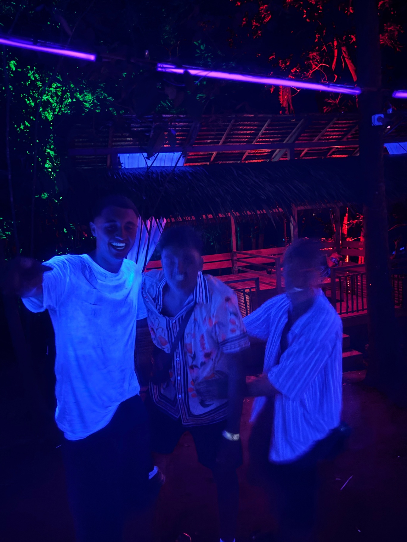 Ko Tao — UV lights and good company on a jungle dancefloor.