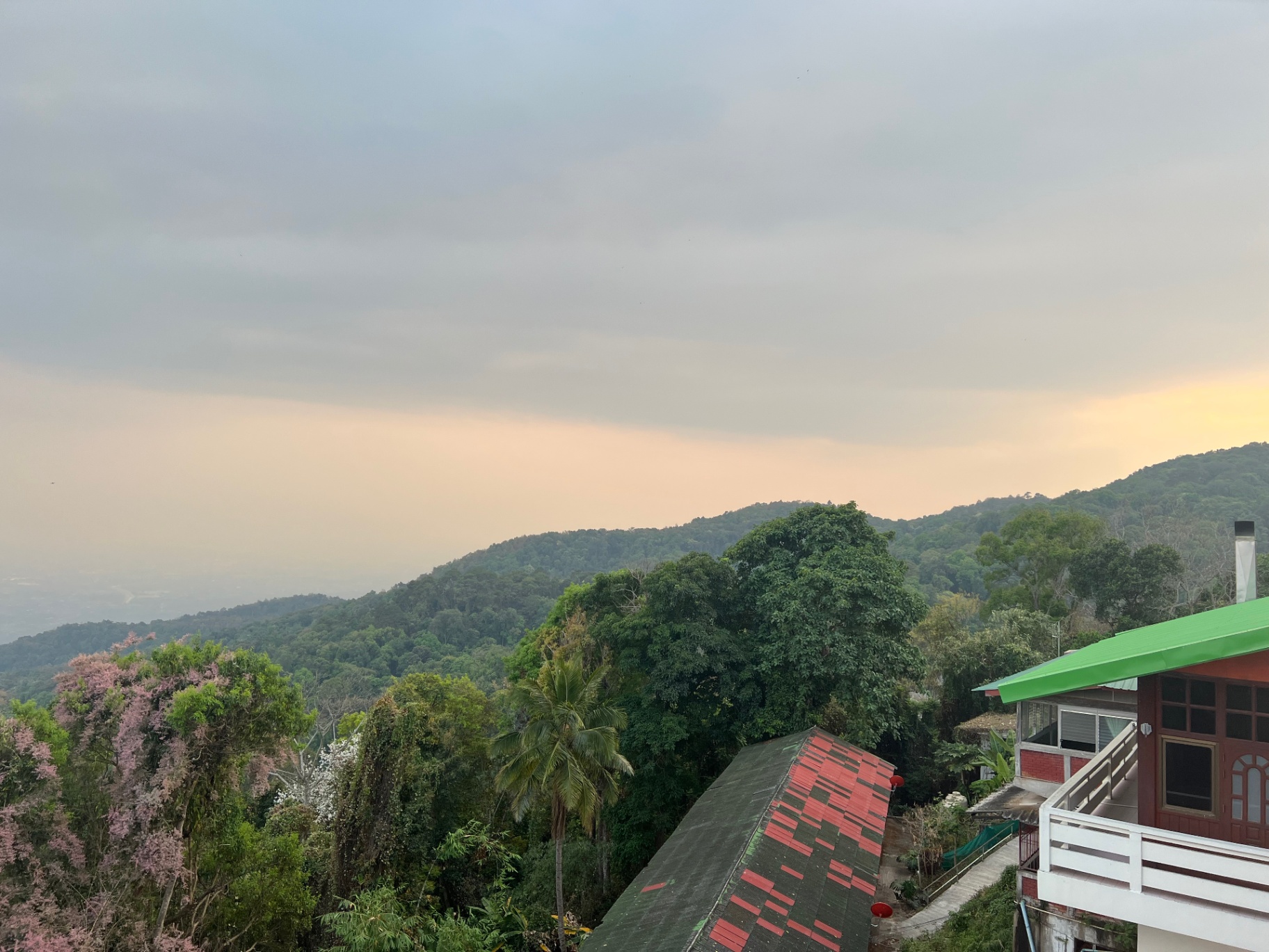 Chiang Mai — Sunset blooming over the hills above Doi Suthep.