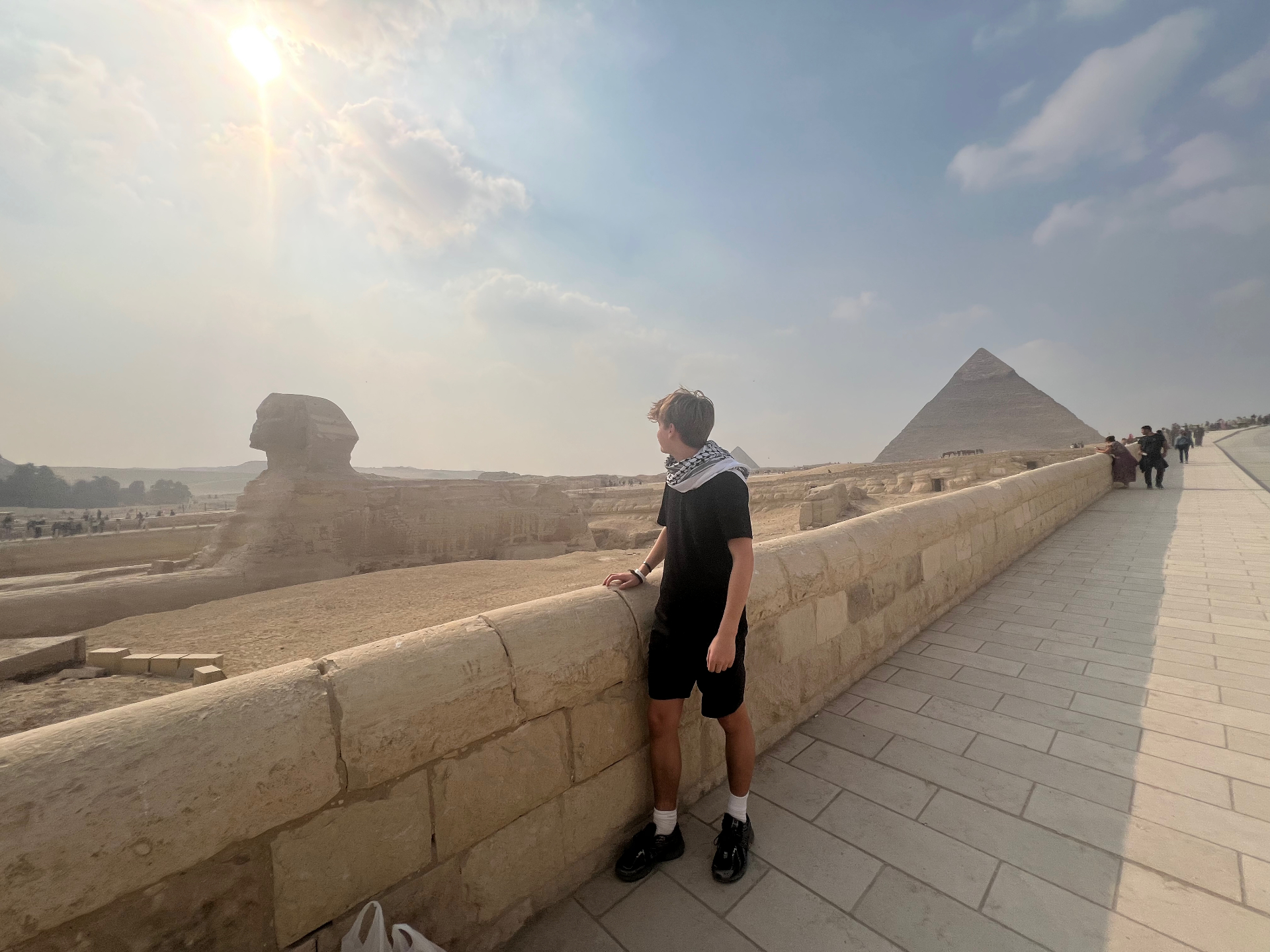 Cairo — The Sphinx keeps watch beside Khafre's pyramid.