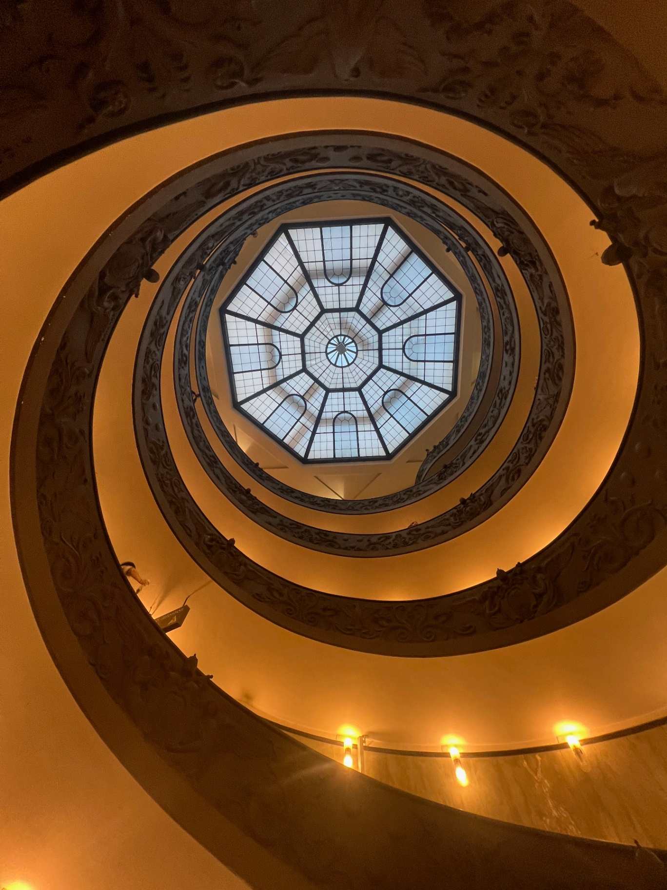 Rome — Looking up the Vatican Museums' spiral staircase to the skylight.