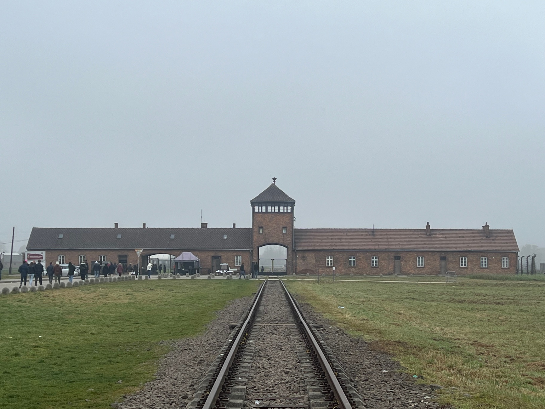 Krakow — Auschwitz-Birkenau gatehouse in the morning fog.