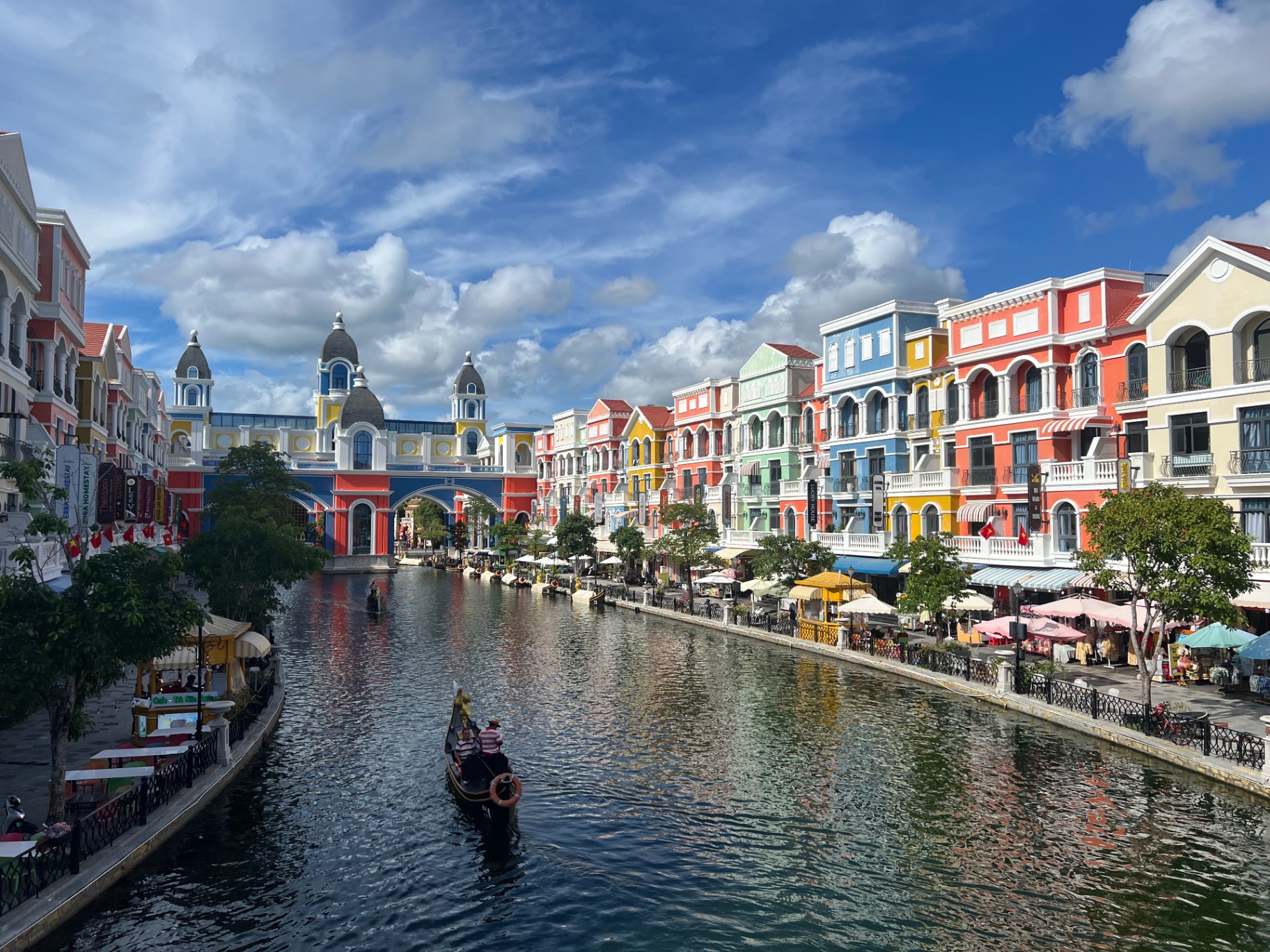Phu Quoc — Grand World canal lined with pastel facades and drifting gondolas.