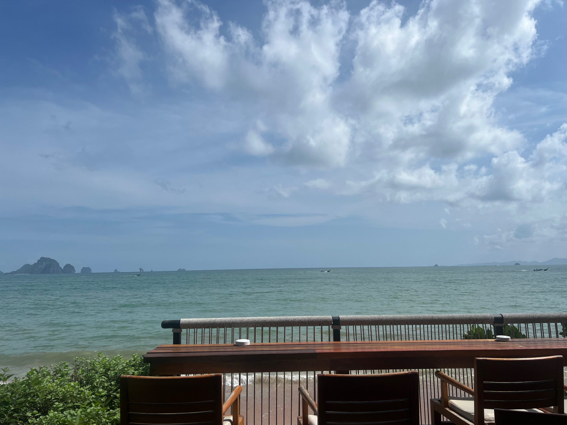 Krabi — Karst islands on the horizon from a beachfront terrace.