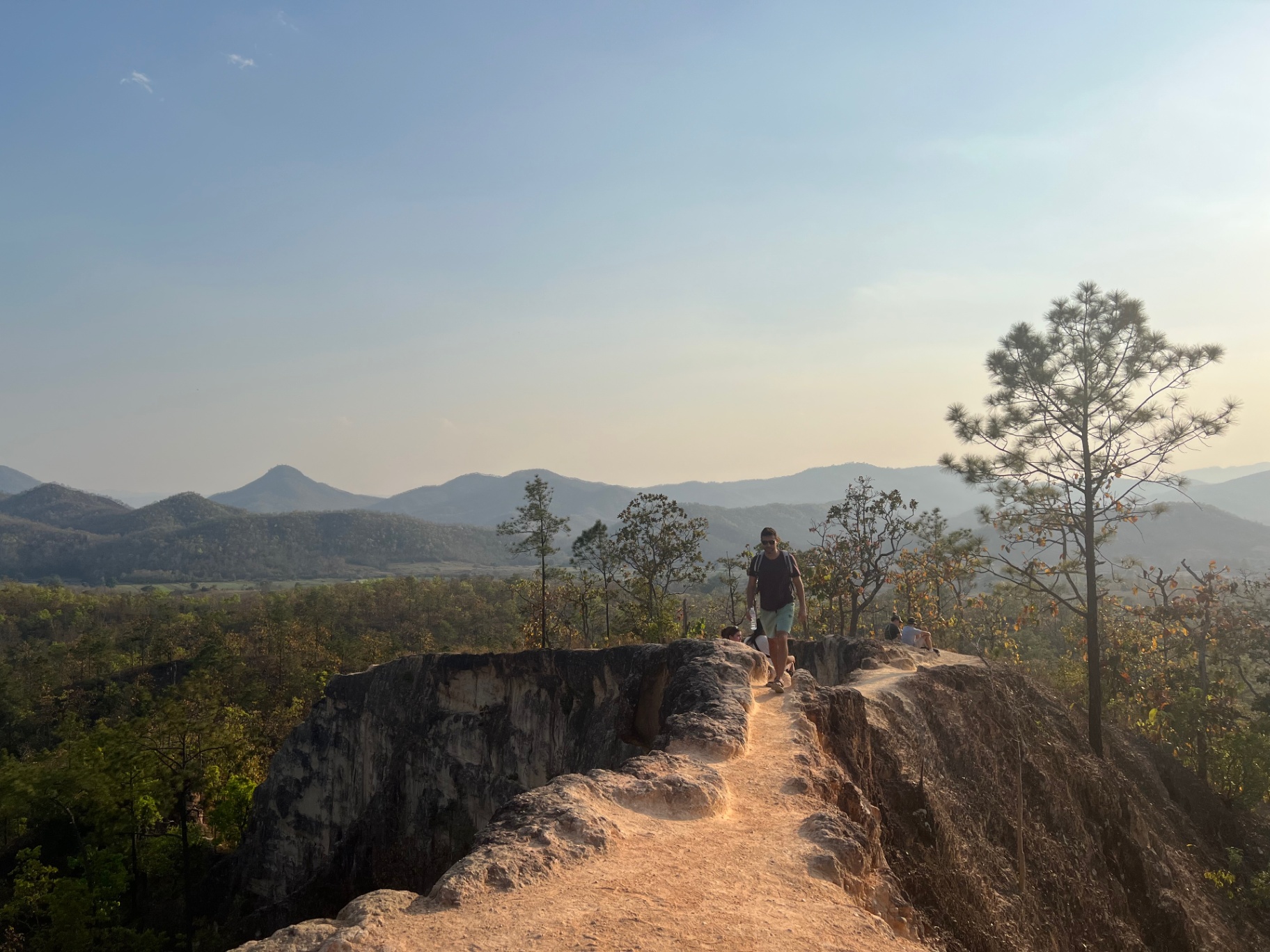 Pai — Walking the knife-edge ridges of Pai Canyon at golden hour.