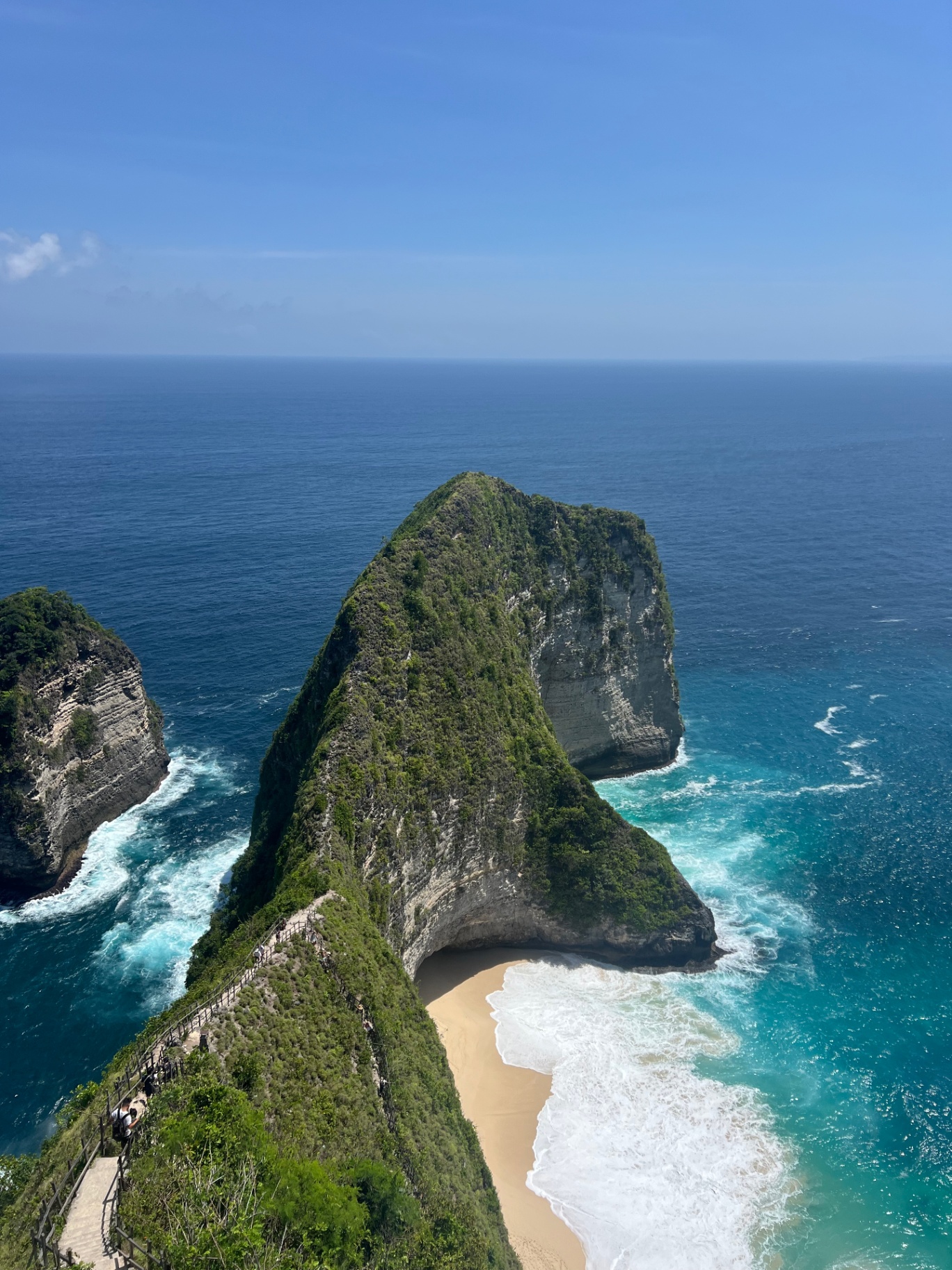 Nusa Penida — Kelingking Beach — the T-Rex cliff dropping into turquoise surf.
