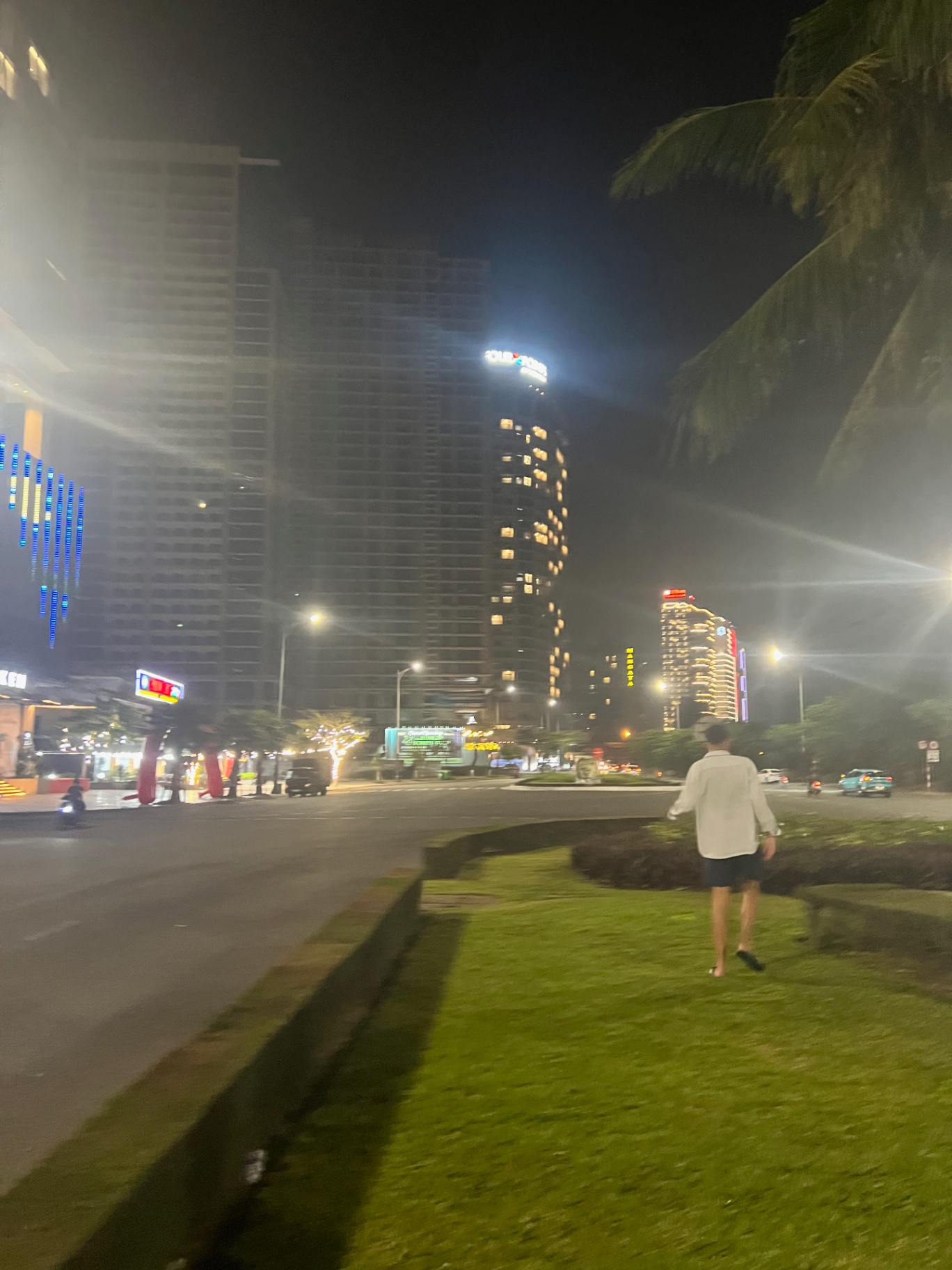Da Nang — Beachfront towers lit up along the My Khe waterfront at night.