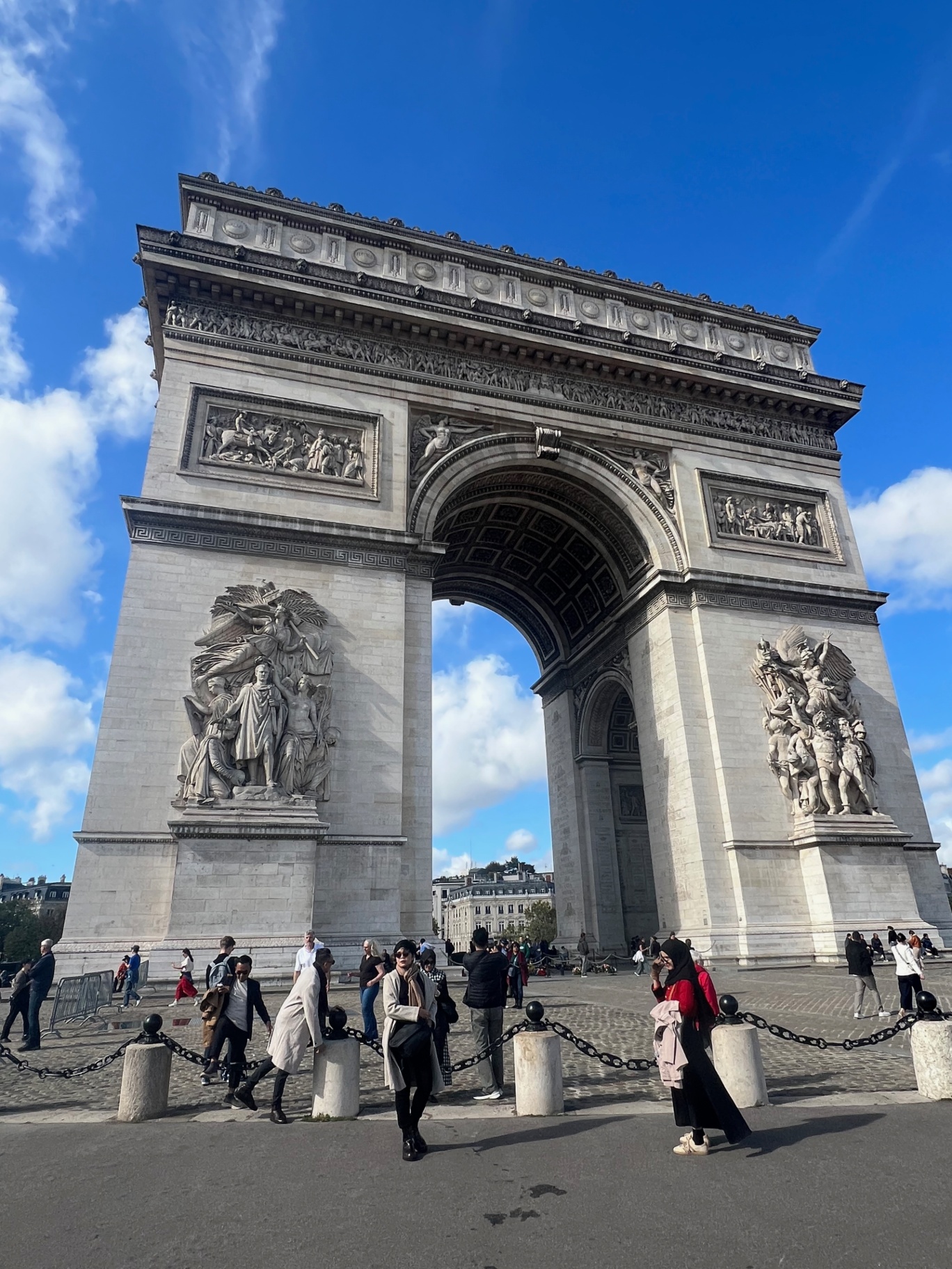 Paris — Arc de Triomphe on a crisp blue afternoon.