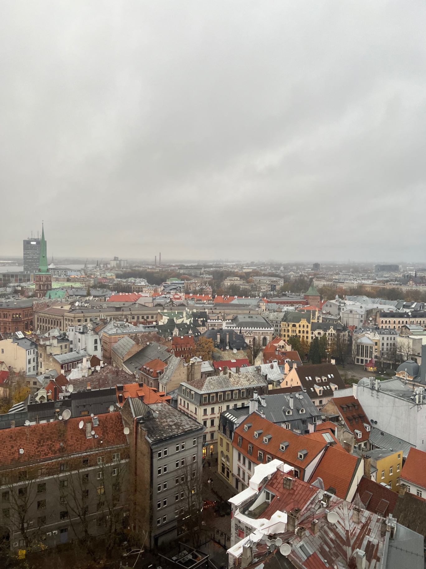 Riga — Riga's red rooftops under a heavy Baltic sky.