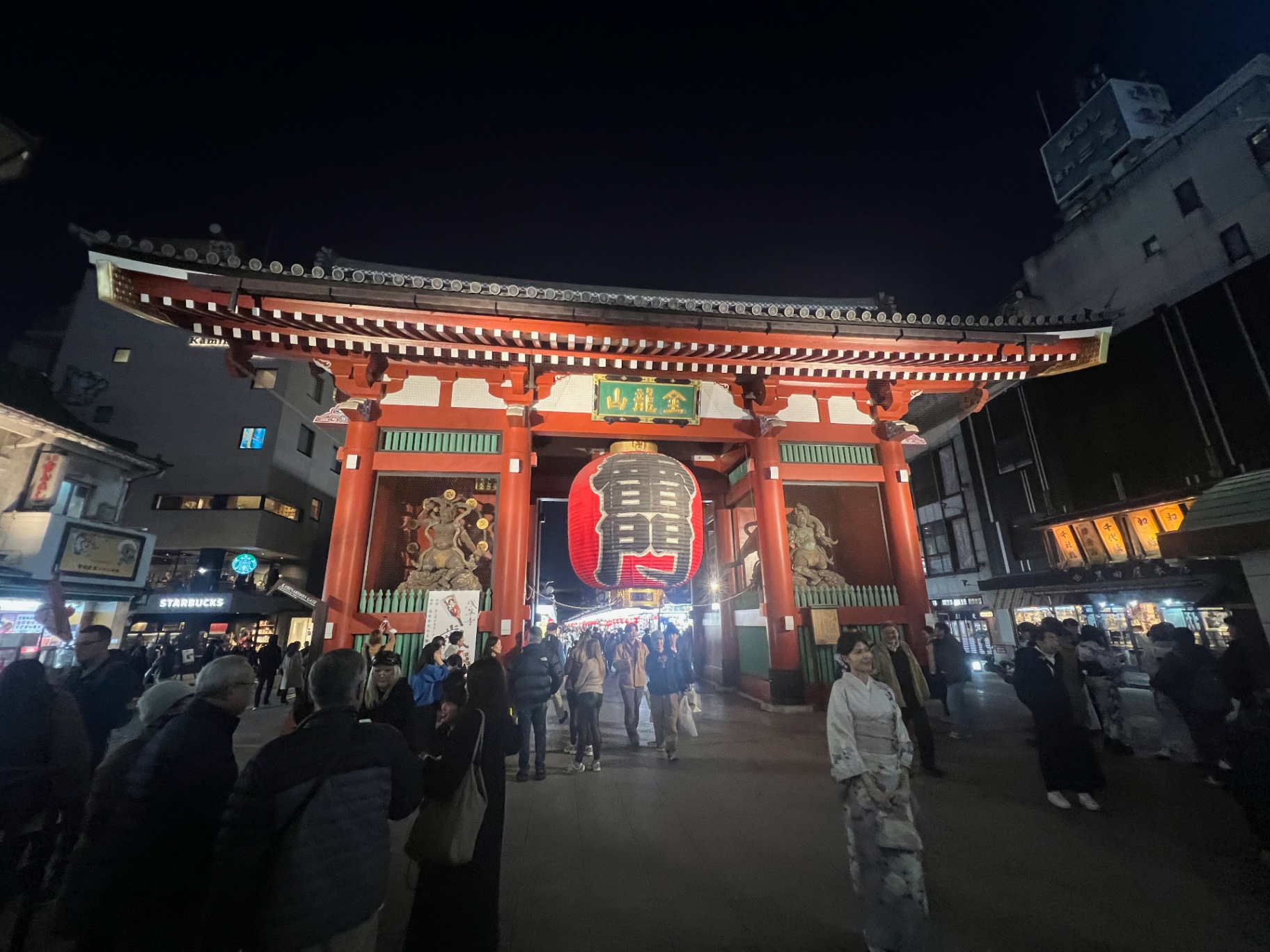 Tokyo — Kaminarimon's great red lantern at night, gateway to Asakusa.