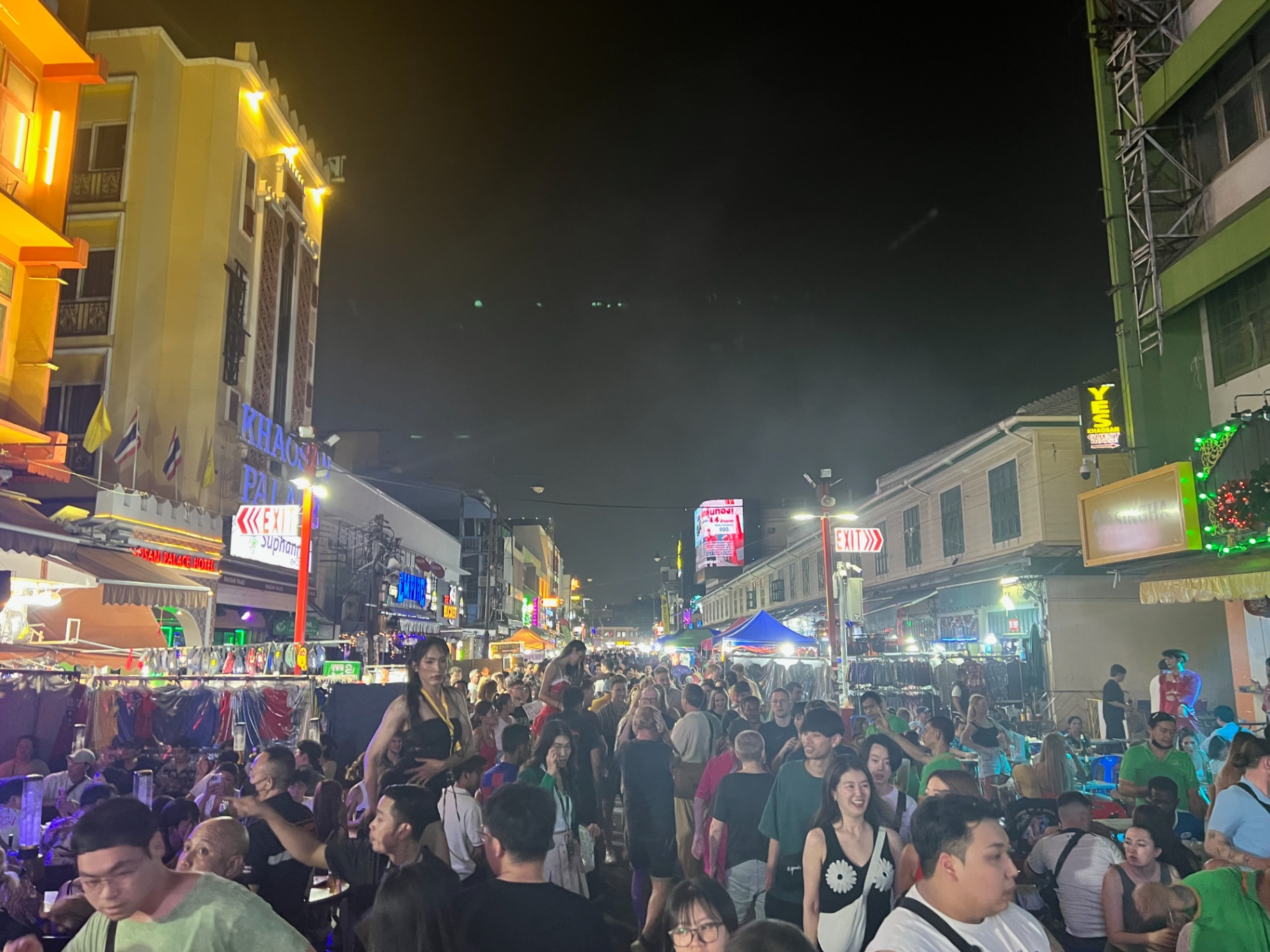 Bangkok — Khao San Road heaving with crowds, stalls and neon.