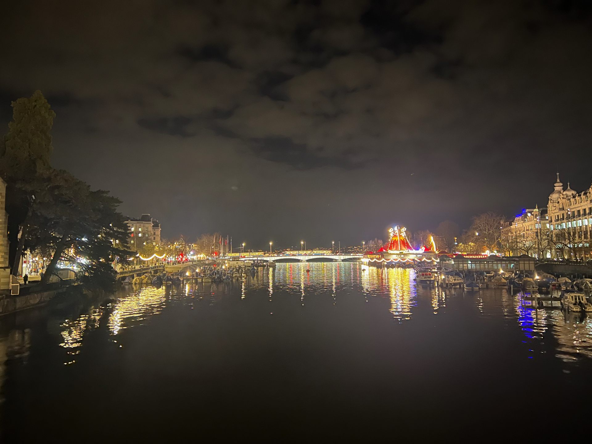 Zurich — Lake Zurich shimmering with winter lights at night.