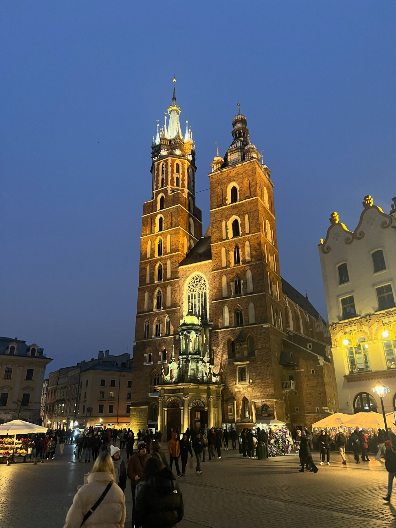 Krakow — St. Mary's Basilica on the Main Square at blue hour.