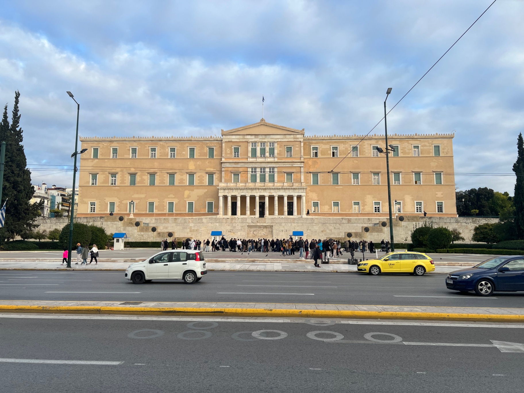 Thessaloniki — Neoclassical façade across a busy boulevard.