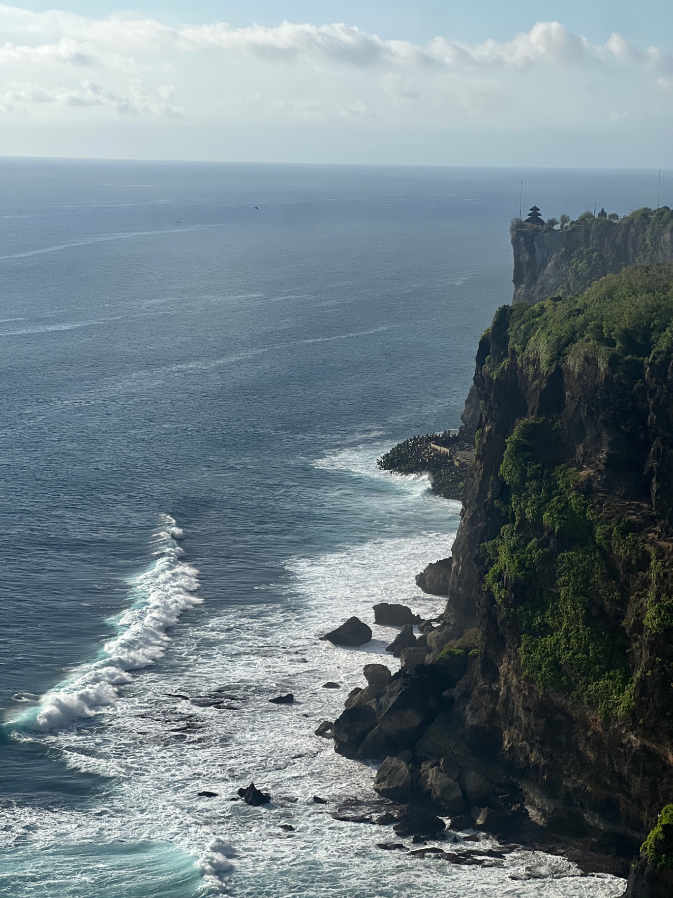 Nusa Penida — Uluwatu temple perched on the cliff's edge above the Indian Ocean.