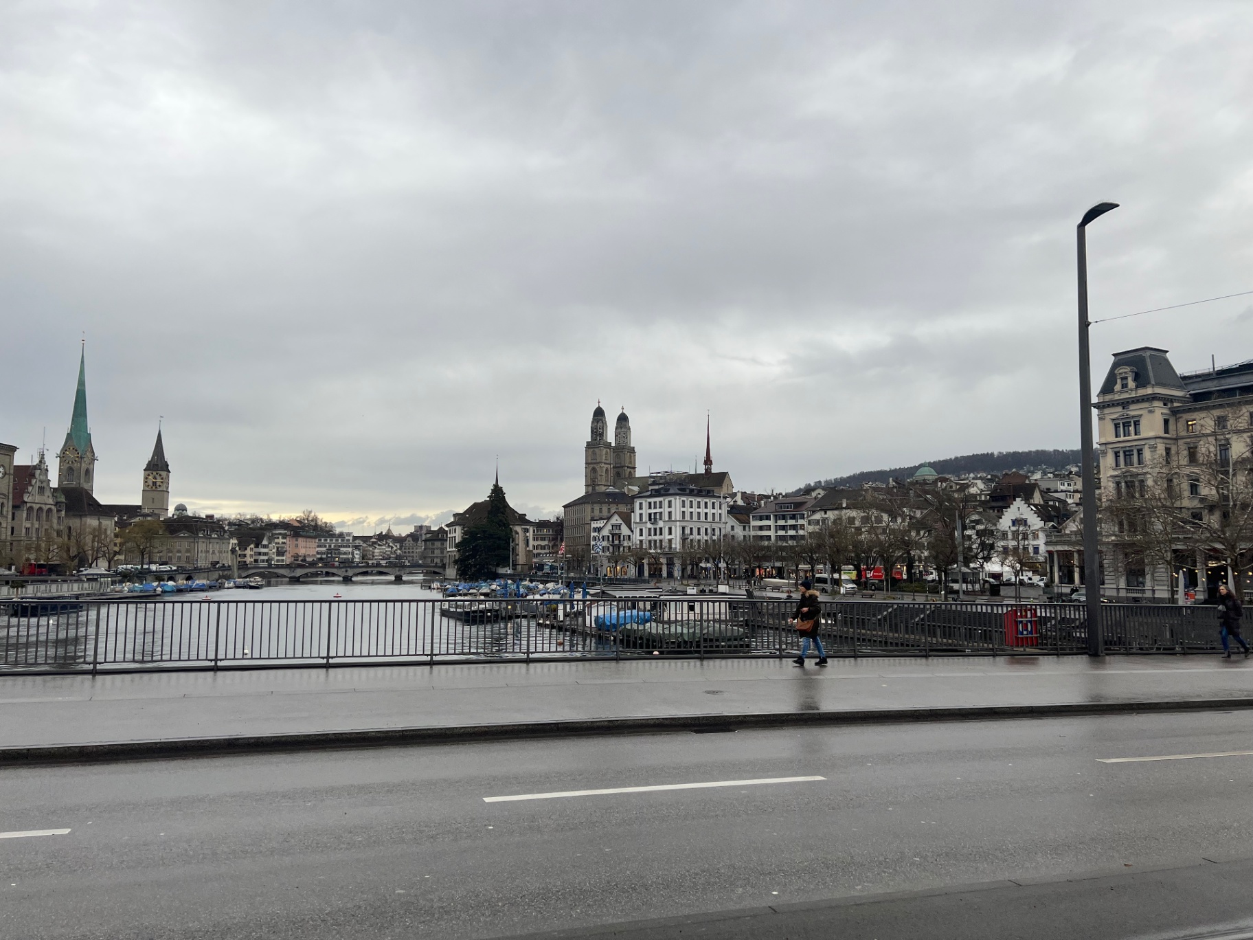 Lyon — Riverside view under heavy winter skies.