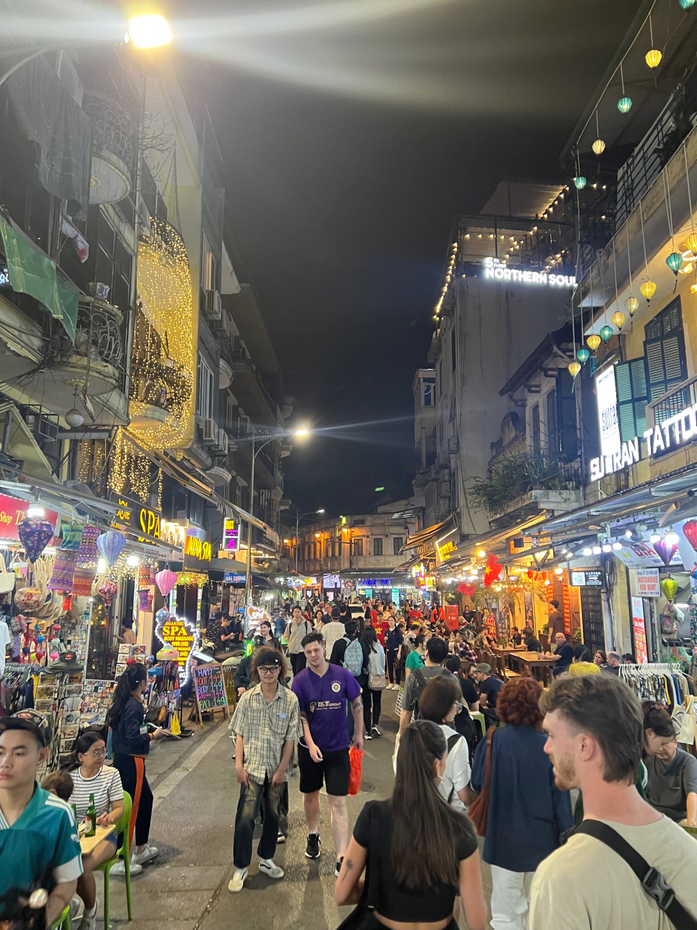 Hanoi — Old Quarter buzzing under lanterns and neon.