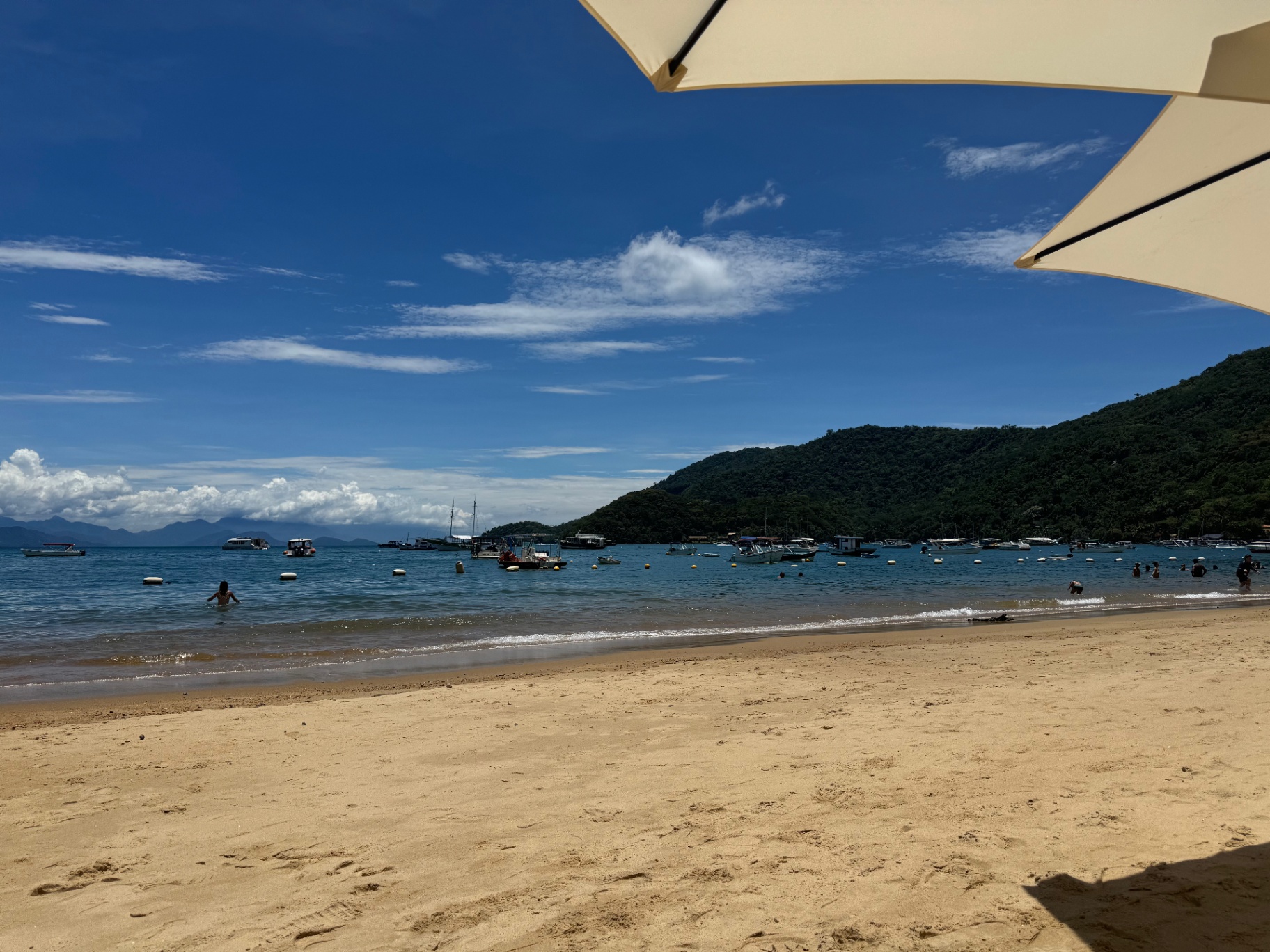 Ilha Grande — Quiet beach afternoon under a parasol.
