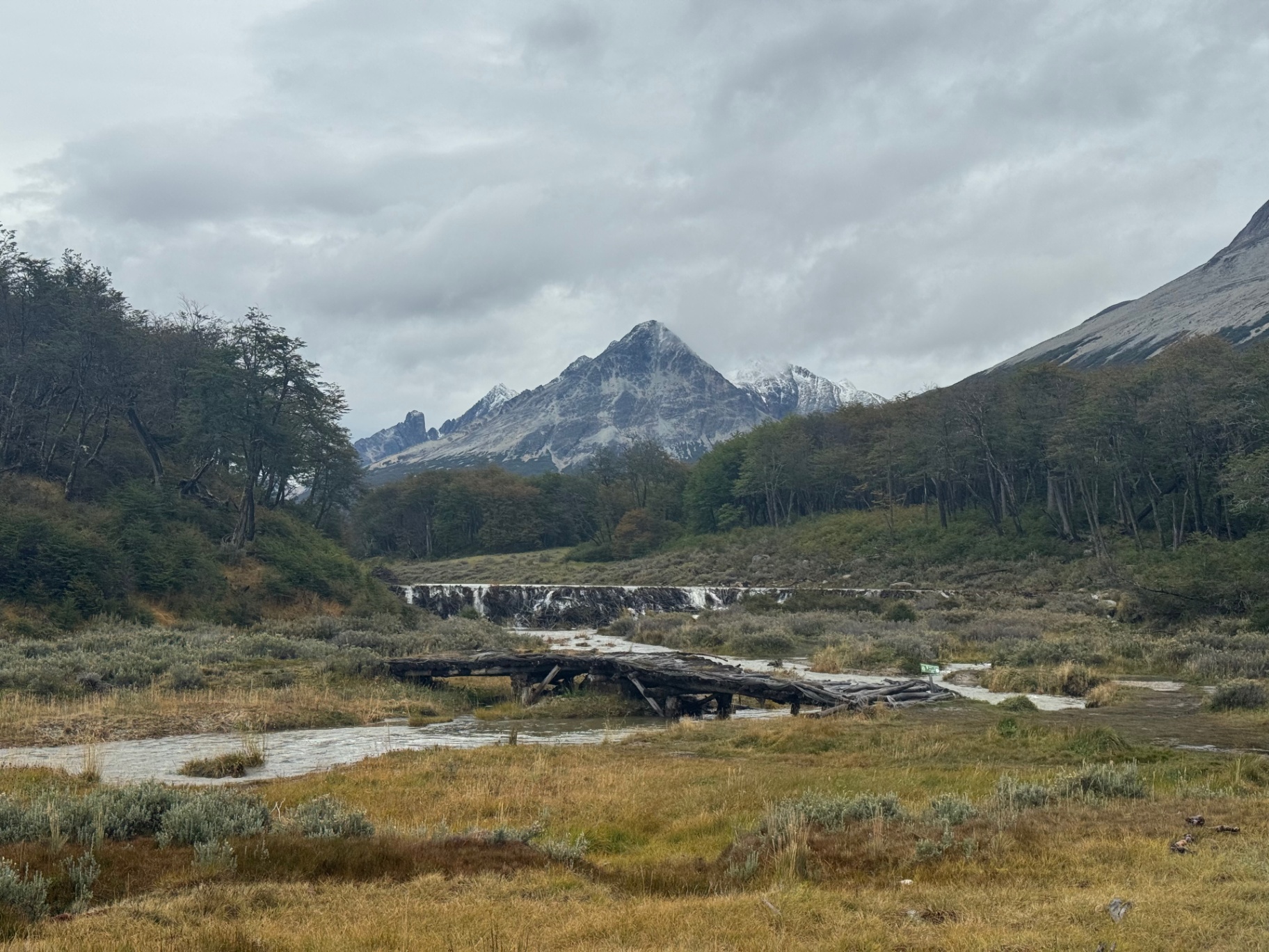 Ushuaia — Snow-dusted peaks rising beyond the valley floor.