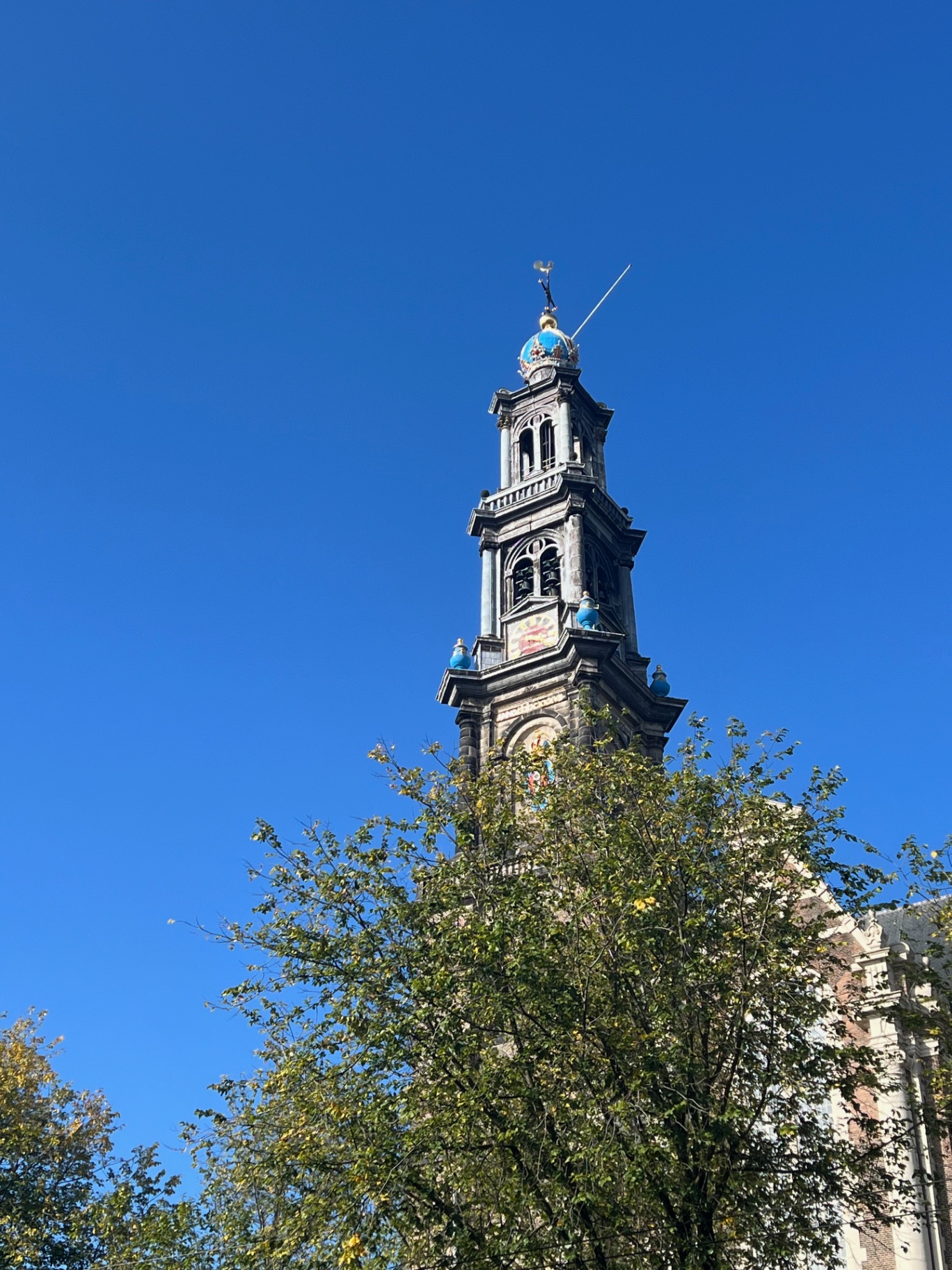 Amsterdam — Westerkerk tower against an autumn sky.