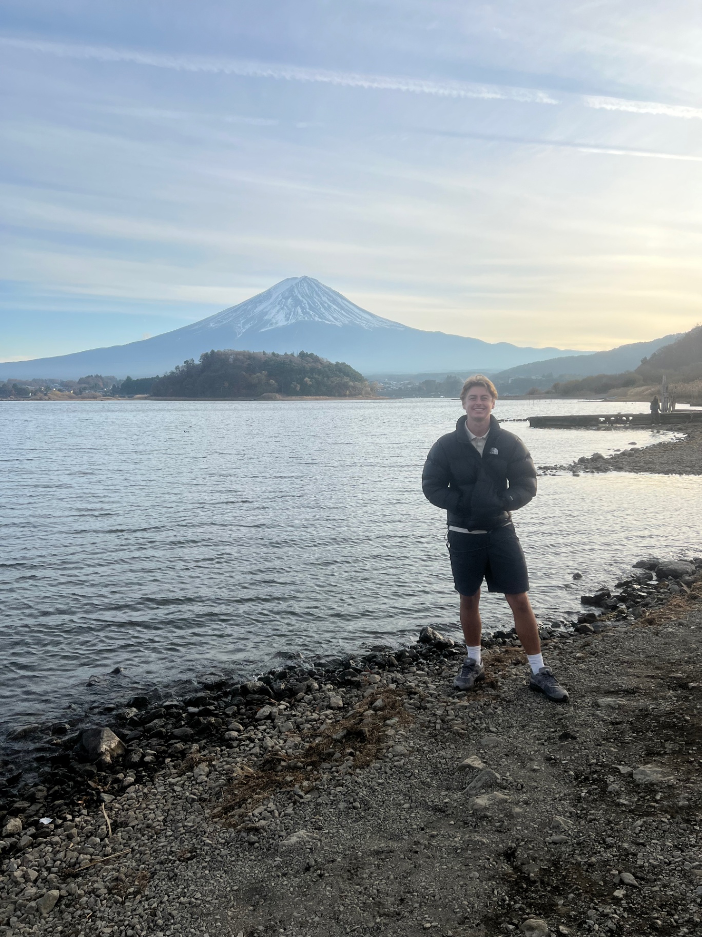 Mount Fuji — Lakeside portrait with snow-capped Fuji in the background.