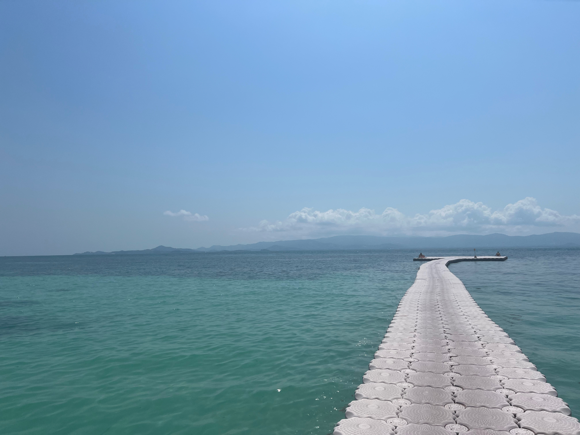Ko Pha Ngan — Floating walkway over turquoise water near Koh Ma.